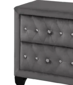 Crystal tufted velvet nightstand with two drawers and eco-friendly wood top in a modern bedroom setting