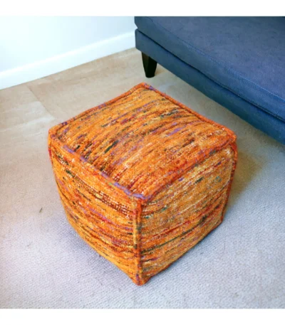 Orange cube pouf ottoman made from recycled silk and cotton blend, perfect as a footrest or accent seat