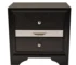Traditional black nightstand with drawers in a bedroom setting