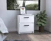 Minimalist white nightstand with two drawers next to a bed