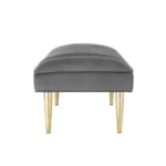 Goldoma 53 inch light gray velvet bench with gold metal frame in a bedroom setting