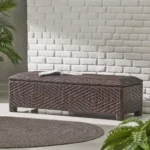 Goldoma PE wicker storage bench with hidden compartment in weathered brown finish on patio