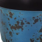 Large blue planter with powder-coated finish on a patio