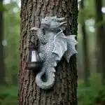 Solar dragon lantern glowing on a tree trunk at night, dragon figurine resin garden decor