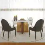 Pandora Round Sintered Stone Dining Table with Rotating Top - 6 Seater – styled in a modern Round Dining Tables setting