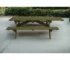 Green solid wood folding dining table set up outdoors with benches for 8 people