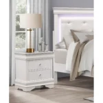 White nightstand with drawers featuring faux alligator embossed drawer fronts