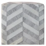 Goldoma gray and ivory hair on hide chevron pouf ottoman in a living room setting