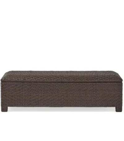 Goldoma PE wicker storage bench with hidden compartment in weathered brown finish on patio