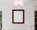 Goldoma modern fabric pendant light with three bulbs, hanging above a wooden dining table in a bright living room.