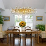 Modern crystal chandelier dining room oval tree branch pendant hanging above a dining table