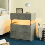 Gray 3 drawer nightstand with LED lighting and acrylic board top in a modern bedroom
