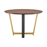 Round dining table for 4 with brown wood top and gold iron sled base in a cozy dining room