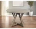 Goldoma 48-inch round pedestal dining table in rustic oak solid wood with pedestal base in a cozy dining room setting