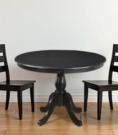42-inch round pedestal dining table in black wood finish by Goldoma