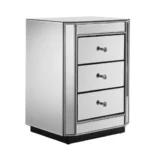Crushed diamond mirrored nightstand with three drawers in a modern bedroom setting
