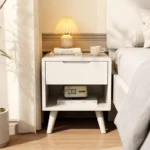 Mid-century solid walnut nightstand with drawer in bedroom setting