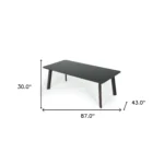 Goldoma 87" black and rose gold rectangular dining table with high-gloss finish in a modern dining room setting