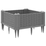 Large garden planter in light grey polypropylene with green plants on patio