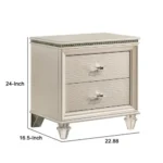 Goldoma traditional 2-drawer nightstand with diamond clear acrylic legs in pearl white finish placed next to a bed