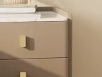 Beige leather narrow nightstand with drawers and stone top, perfect as a small bedside table