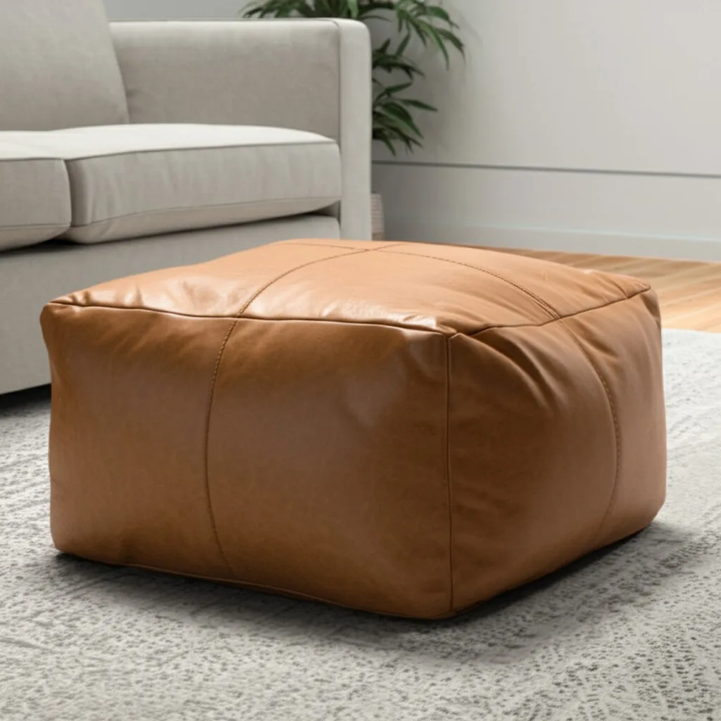 H897eec71d6644e24a2c57dce4c2054d0j.webp Goldoma 22 inch tan genuine leather pouf ottoman as a footrest