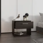 Modern walnut nightstand with drawer and shelf in a bedroom setting