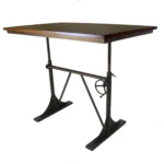 Goldoma 48 inch solid wood and iron trestle dining table with brown top and black base in a dining room setting