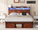 Goldoma queen bed with storage headboard, LED lights, and charging station in a modern bedroom