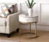 Modern nightstand with drawer featuring marble top and gold base in bedroom