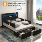 Goldoma full size bed frame with storage drawers, LED lights, and charging station in a modern bedroom