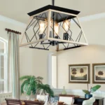 Close-up of the pendant chandelier's oak finish and black metal cage, showing the four light sockets without bulbs.