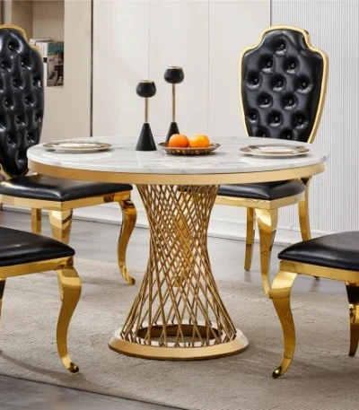 47-inch round marble dining table with stainless steel base in a modern luxury dining room setting
