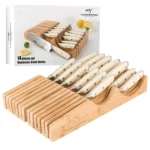 Damascus knife set with bamboo block and ABS handles on kitchen counter