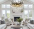 Modern black chandelier with crystal accents in a dining room setting