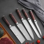 Five-piece Japanese kitchen knives set including paring, boning, butcher, bread, and chef knife on cutting board
