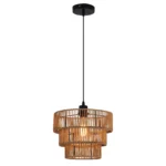 1-Light Farmhouse Rattan Boho Pendant Light in a kitchen setting, casting ambient light over a dining table.