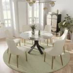 Goldoma luxury rotating dining table with sintered stone marble top and metal legs in a modern dining room