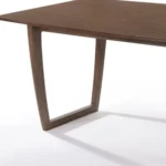 63 inch rectangular walnut dining table from Goldoma with solid wood legs and manufactured wood top