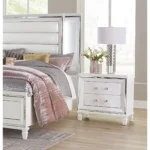 White silver finish nightstand with 2 drawers and acrylic bar pulls in a modern bedroom setting