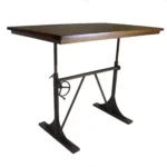 Goldoma 48 inch solid wood and iron trestle dining table with brown top and black base in a dining room setting