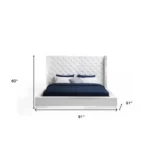 Goldoma black tufted faux leather king bed frame in modern bedroom setting