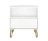 Small white nightstand with gold hairpin legs and drawer in bedroom setting