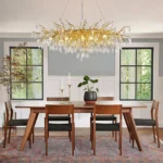 Modern crystal chandelier dining room oval tree branch pendant hanging above a dining table