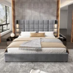 Goldoma California king upholstered bed frame with USB ports and wall sconces in gray velvet