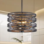 Walnut and black metal cage chandelier against a brick wall, emphasizing the industrial style and wood-metal contrast.