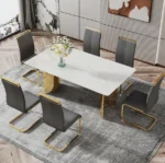 Modern square stone dining table with white marble glass top and gold metal legs in a contemporary dining room