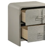 Modern 2-drawer nightstand beige with textured metal handles next to bed