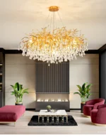 Modern crystal chandelier with brass and black finish illuminating a living room