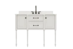 The vanity sink with a modern rectangular basin, integrated into the wooden countertop, surrounded by decorative tiles.